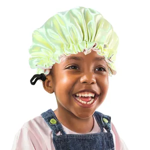 Adjustable light green satin hair bonnet for kids showing buckle and silk texture