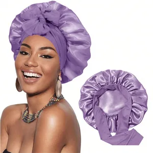Détail du bonnet de nuit en satin double couche avec large bande élastique et nœud ruban