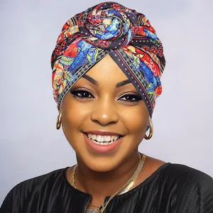 Close-up of vibrant African style paisley pattern print on a soft bohemian turban hat