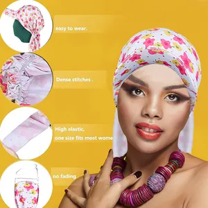 Floral elastic turban cap for women with breathable pink fabric and red flower prints