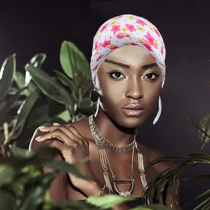 Women's white baseball cap featuring pink floral patterns with breathable fabric