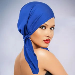 Detailed back view of a royal blue breathable turban with adjustable knotted ties