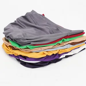 Stack of multi-color high-elastic milk silk underscarf hijabs for Muslim women