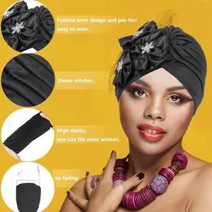 Ethnic pleated turban for women featuring handcrafted flower accents and elastic mesh detail