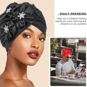 Black turban hat for women with satin sheen flowers and crystal detail for formal occasions