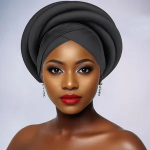 Close-up of black layered African style head wrap with structured sponge twist design