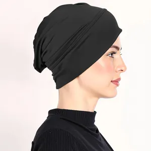Black ribbed turban cap for women with layered design and elastic milk silk fabric