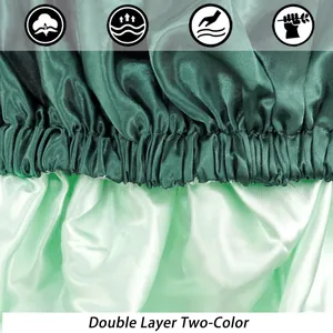 Double-layer satin sleep bonnet in dark green and mint with elasticated band detail