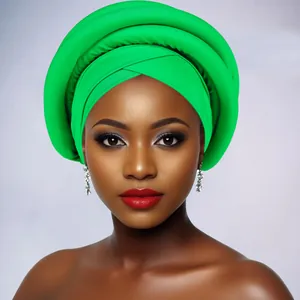 Detail of vibrant green multi-layer sponge twisted headwrap with rhinestone earrings