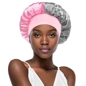 Satin sleep bonnet in pink and silver grey with wide elastic band for hair care