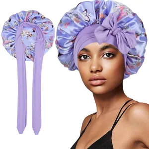 Detail of purple floral satin bonnet showing long wide ties and smooth silky texture
