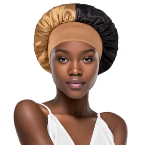 Detail of wide elastic band on two-tone gold and black satin silk sleep bonnet