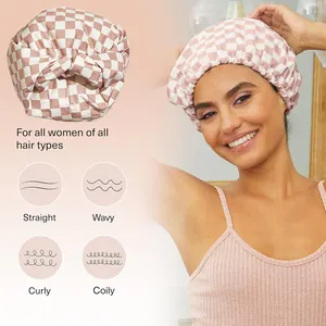 Pink checkered waterproof shower cap with silk lining and decorative bow for all hair types