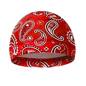 Close-up of red paisley print bandana skull cap showing detailed ethnic pattern and fabric
