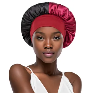 Detail of dual-color satin sleep bonnet with red elastic wide band for hair protection