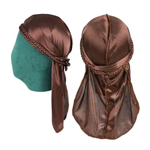 Detail view of coffee silk durag with braided band and high-gloss satin texture