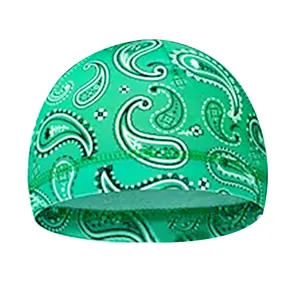 Detail view of neon green paisley bandana cap with reinforced stitching and stretch fabric