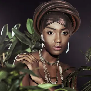 African style bronze metallic turban with layered wrap design and textured finish