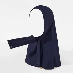 Detail view of dark blue elastic hijab with side snap buttons for secure and stylish draping