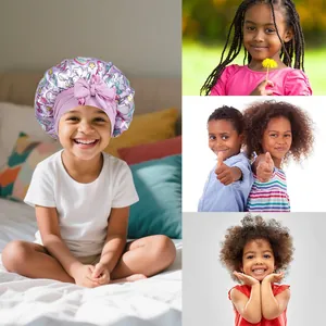 Kids purple satin hair bonnet with cute unicorn prints and decorative bow for sleep care