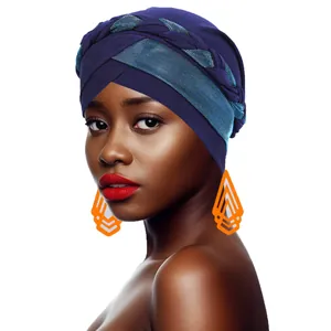 Detail of navy blue turban with shiny silk braid and cross forehead design on a model