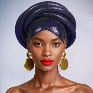 Detail view of purple metallic pleated fabric on an African style Gele headwrap scarf