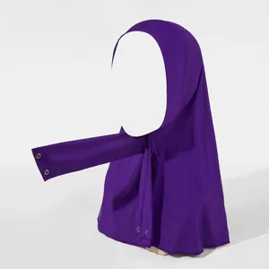 Detail of purple elastic turban hijab featuring metal snap buttons and adjustable long straps
