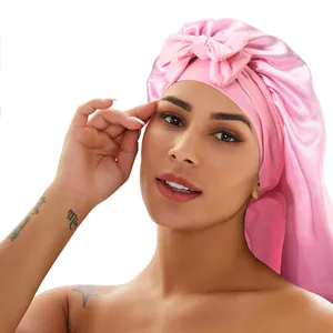 Pink satin long hair bonnet with elastic wide band and decorative bow for sleep care
