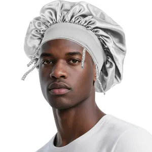 Detail of silver satin sleep bonnet with wide elastic band and woven rope accents