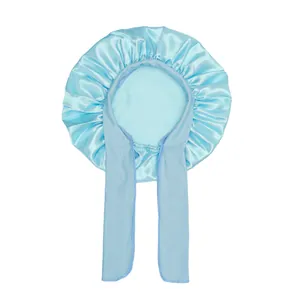 Detail of light blue satin hair bonnet showing the smooth texture and elastic ribbons