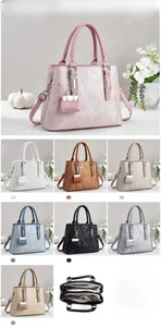 Detailed view of striped metallic handbag with size 30x12.5x23cm and color options