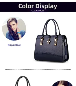 Close-up of royal blue crocodile embossed patent leather with golden metal lock detail