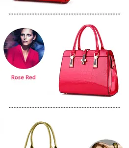 Detailed view of magenta crocodile pattern handbag with sturdy handles and metal clasp