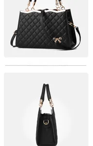 Détail du profil latéral du sac bandoulière noir matelassé avec nœud en métal doré