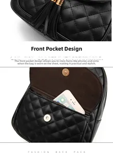 Detail view of black quilted backpack featuring a gold tassel and front magnetic pocket