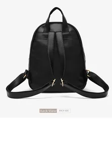 Detail view of the quilted backpack back side with adjustable straps and gold hardware