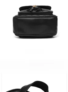 Detail view of the flat bottom and diamond quilted leather pattern of the black backpack