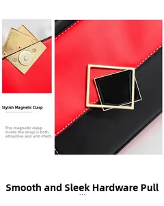 Detail of golden geometric magnetic buckle and metal zipper on red and black PU crossbody bag