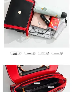 Detailed interior of color-block PU bag showing multi-compartment storage and zipper pockets