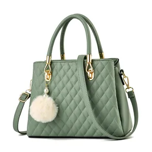 Morandi green quilted handbag with pompom charm and adjustable strap for women