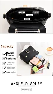 Detail view of the black leather bag interior showing a large capacity for cosmetics and phone