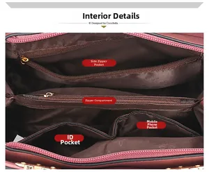 Innenraum der weinroten Handtasche mit Reißverschlussfächern und Logo-Futterstoff