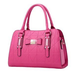 Elegant fuchsia trapezoid handbag with geometric quilting and sweet bow detail