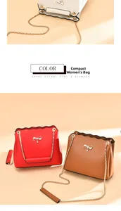 Detail of elegant shoulder bags with wavy flap, metal bow decor and chain straps