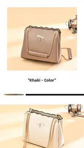 Detail of scalloped edge and golden bow ornament on khaki and beige crossbody bags