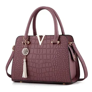 Classic grey-purple tote bag with crocodile texture, gold V hardware and tassel charm