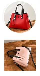 Detail of PU leather handbags featuring silver heart charms and detachable shoulder straps