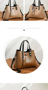 Detail of soft PU leather tote bags with heart charm and adjustable shoulder straps