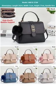 Detailed view of women's textured crossbody bag with metal buckle and color options