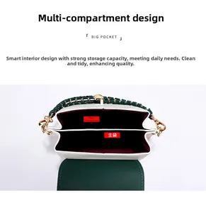 Detail of white mini crossbody bag showing double main pocket storage design